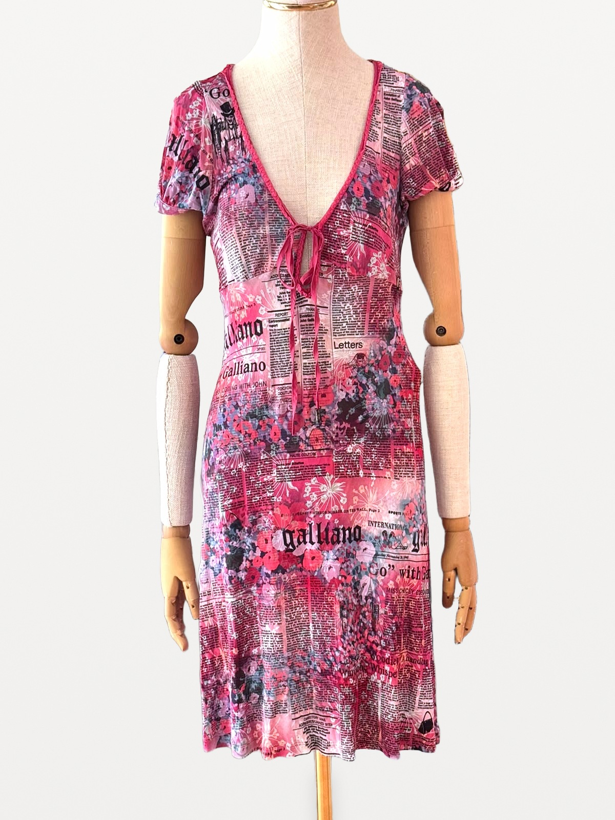 Galliano Galliano dress by John Galliano featuring a ‘Gazette’ newspaper print in shades of pink 4